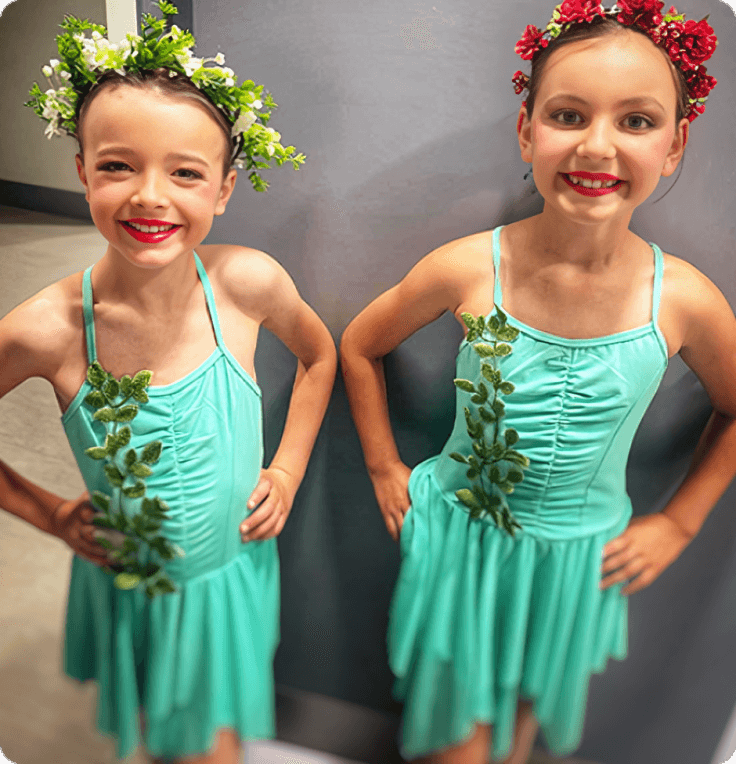 Girls in teal dance dresses