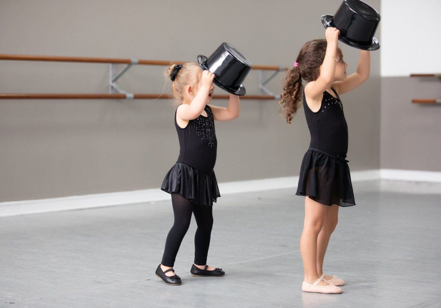 Children performing in a dance studio.
