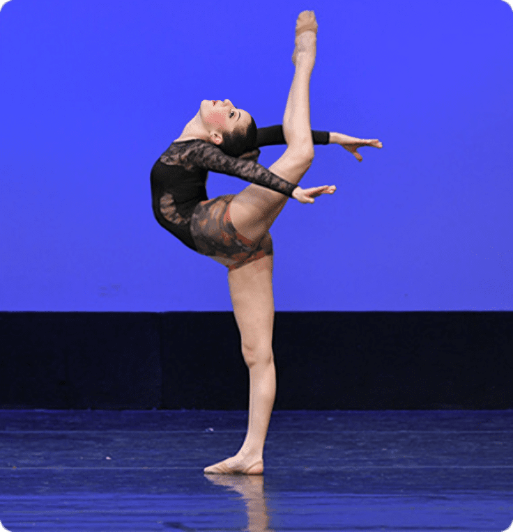 Flexible dancer performing elegant ballet move
