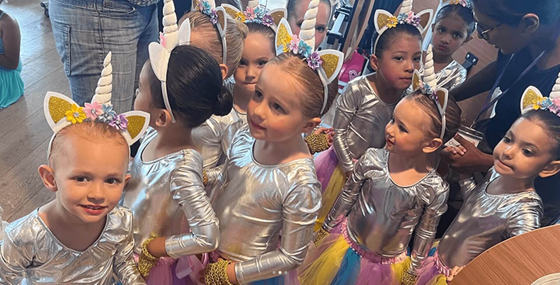 Children in unicorn costumes
