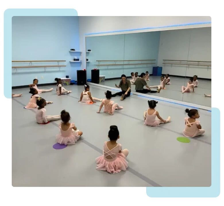 Young ballet students in a dance class.